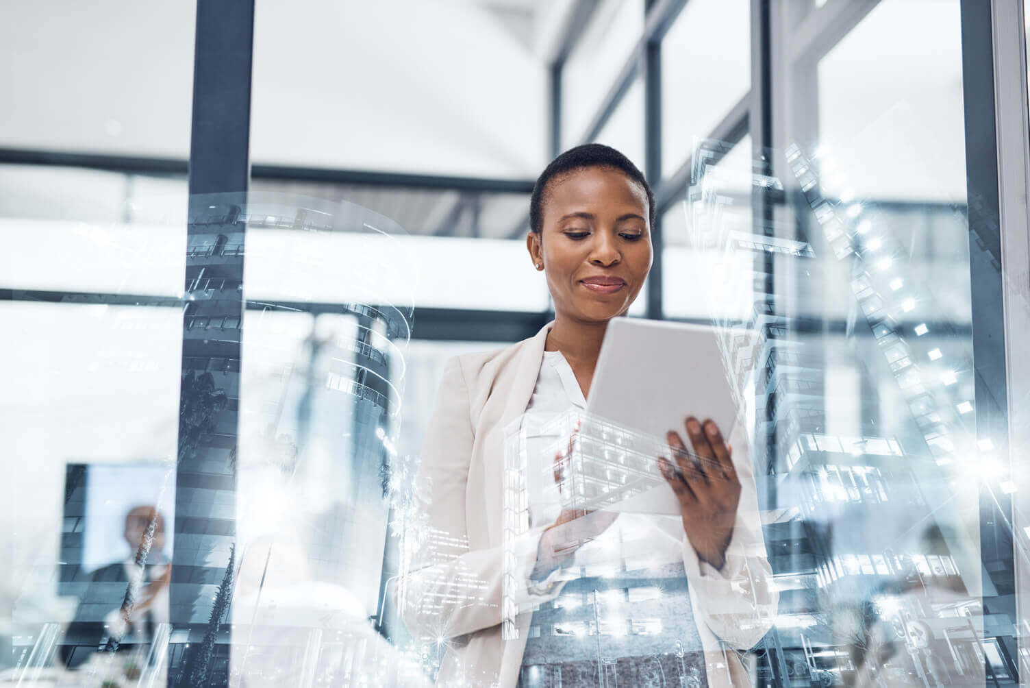 a business woman looking at a tablet